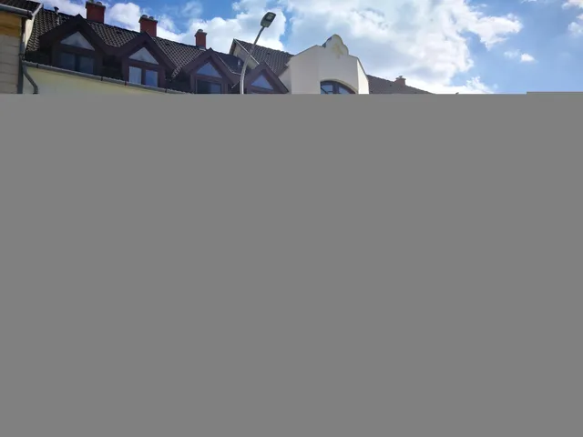 Társasház homlokzati hőszigetelő bevonattal